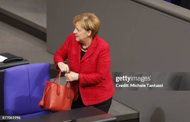 German Chancellor and leader of the German Christian Democrats Angela Merkel arrives at the Reichstag for the first session of the Bundestag, the...