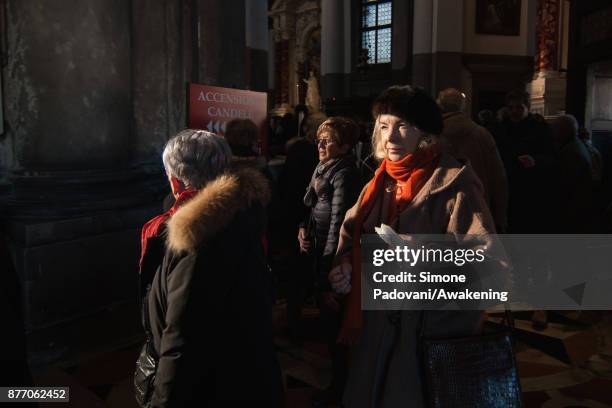 Pilgrims attend the holy mass at Madonna della Salute church on the day of the traditional Festa della Salute on November 21, 2017 in Venice, Italy....