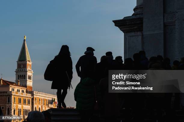 Pilgrims attend at the holy mass at Madonna della Salute church on the day of the traditional Festa della Salute on November 21, 2017 in Venice,...