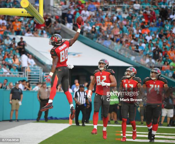 Howard of the Tampa Bay Buccaneers celebrates a touchdown in the second quarter against the Miami Dolphins at Hard Rock Stadium on November 19, 2017...