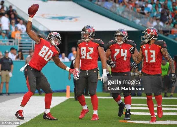 Howard of the Tampa Bay Buccaneers celebrates a touchdown in the second quarter against the Miami Dolphins at Hard Rock Stadium on November 19, 2017...