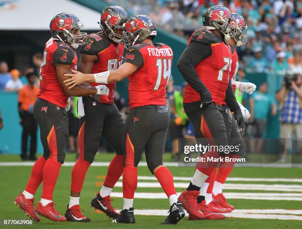 Howard of the Tampa Bay Buccaneers celebrates a touchdown in the second quarter against the Miami Dolphins at Hard Rock Stadium on November 19, 2017...