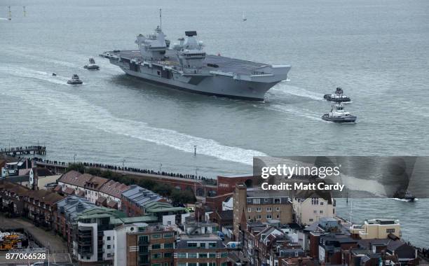 Queen Elizabeth sails into her home port of Portsmouth Naval Base following sea trials and ahead of being formally commissioned into the Royal Navy...