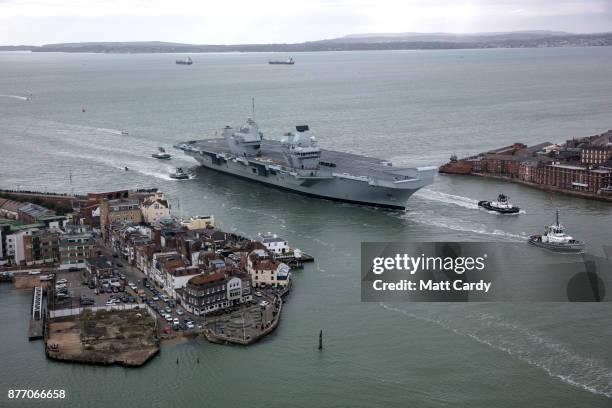 Queen Elizabeth sails into her home port of Portsmouth Naval Base following sea trials and ahead of being formally commissioned into the Royal Navy...