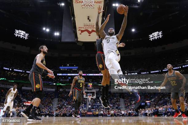 DeMarcus Cousins of the New Orleans Pelicans shoots during the second half of a game against the Atlanta Hawks at the Smoothie King Center on...