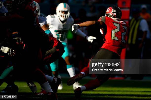 Doug Martin of the Tampa Bay Buccaneers runs the ball in the fourth quarter against the Miami Dolphins at Hard Rock Stadium on November 19, 2017 in...