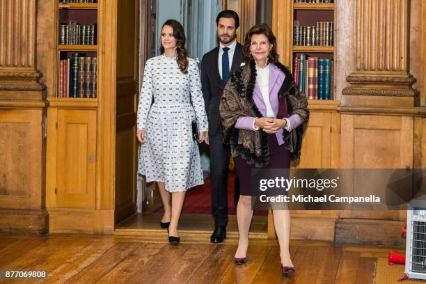 Queen Silvia of Sweden, Princess Sofia of Sweden, and Prince Carl Phillip of Sweden attend a symposium on "Dyslexialand" at the Royal Palace on...