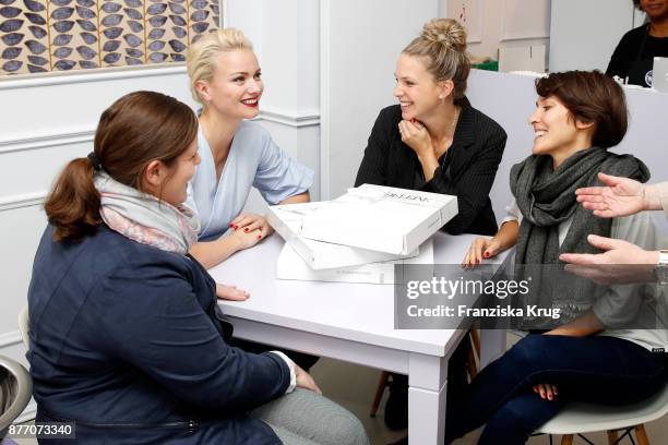 Model Franziska Knuppe with Melanie Zemanek, Katrin Matuschek and Ines Dang hands over the donation to the Tribute to Bambi Foundation by MADELEINE...