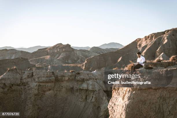 boy disconnecting - laptop desert stock pictures, royalty-free photos & images