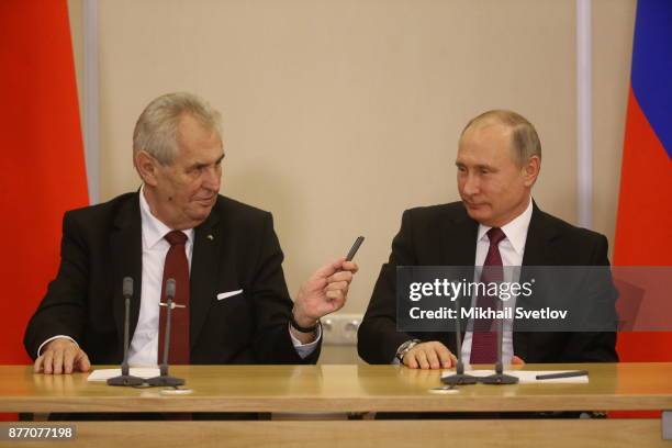 Russian President Vladimir Putin talks to Czech President Milos Zeman during their talks at Black Sea resort state residence of Bocharov ruchey in...