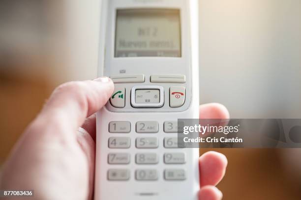 white cordless telephone - telefono fijo fotografías e imágenes de stock