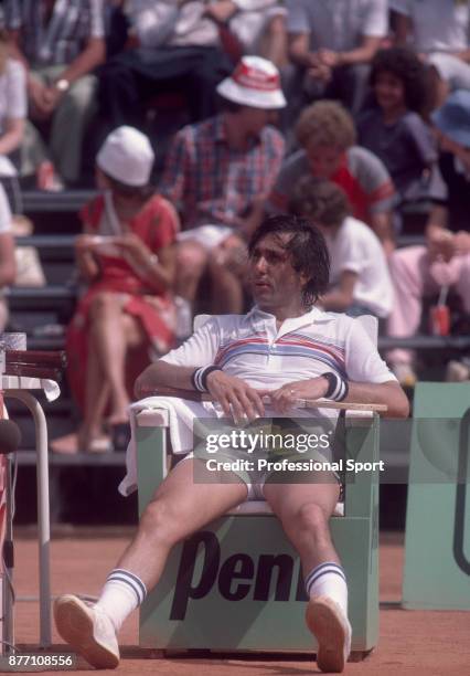 Ilie Nastase of Romania taking a break during the French Open Tennis Championships at the Stade Roland Garros circa June 1982 in Paris, France.