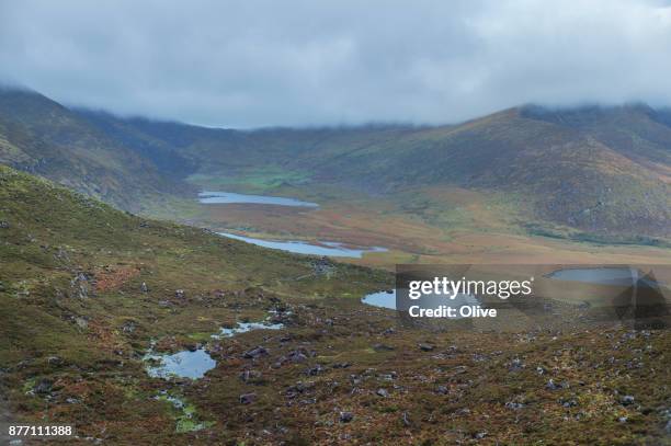 conor pass in dingle bay in autumn - connor pass stock pictures, royalty-free photos & images