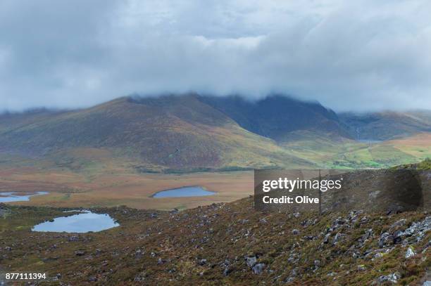 conor pass in dingle bay in autumn - connor pass stock pictures, royalty-free photos & images