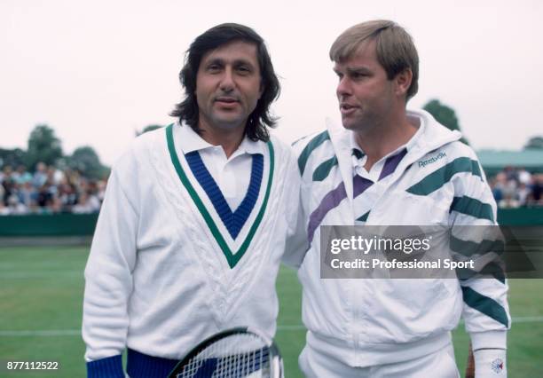 Veteran tennis players Ilie Nastase of Romania and Roscoe Tanner of the USA photographed during the Wimbledon Lawn Tennis Championships at the All...