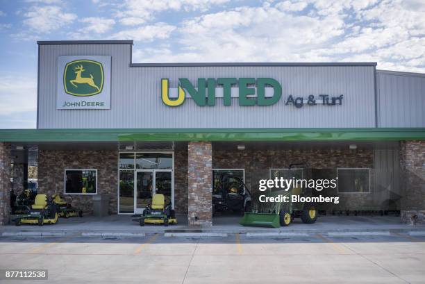 Deere & Co. John Deere lawn mowers and tractors sit on display at a United Ag & Turf dealership in Waco, Texas, U.S., on Monday, Nov. 20, 2017. Deere...