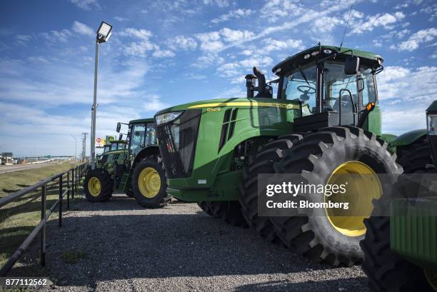 Deere & Co. John Deere 9510 R tractor sits on display at a United Ag & Turf dealership in Waco, Texas, U.S., on Monday, Nov. 20, 2017. Deere & Co. Is...