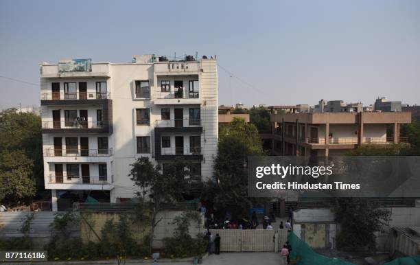 Police outside the building, house no. 204 where the shootout took place near Dwarka Morh Metro Station in the morning on November 21, 2017 in New...