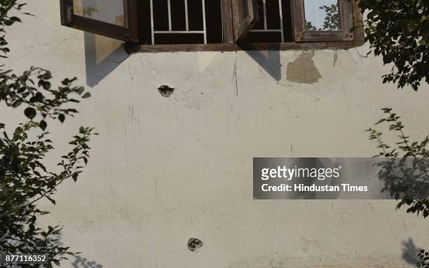 Bullet marks on the building where shootout took place near Dwarka Morh Metro Station in the morning on November 21, 2017 in New Delhi, India. Five...