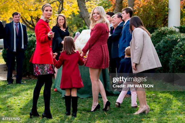 Ivanka Trump holds her daughter Arabella Kushner's hand as Tiffany Trump and White House Press Secretary Sarah Sanders walk up to see the pardoned...