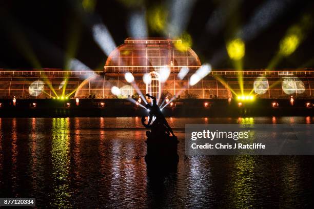 The Palm House at Kew Gardens is illuminated with a light show during a preview for the Christmas at Kew event on November 21, 2017 in London,...