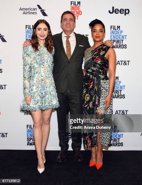 Actor Lily Collins, President of Film Independent Josh Welsh, and actor Tessa Thompson attend the Film Independent 2018 Spirit Awards press...