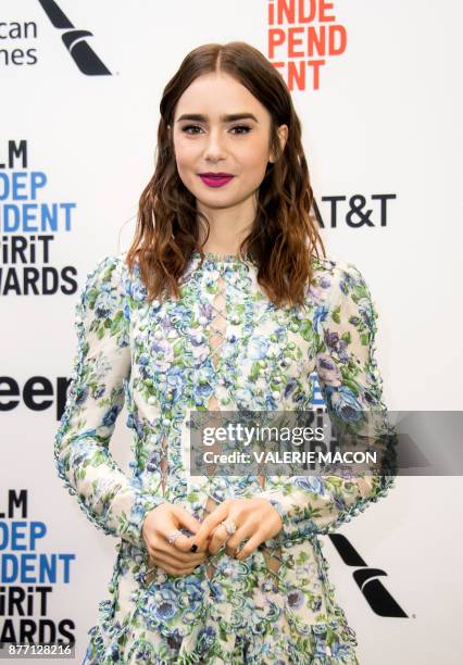 Actress Lily Collins poses during the 2018 Spirit awards during the 2018 Film Independent Spirit Awards Nominations Announcement Press Conference, on...