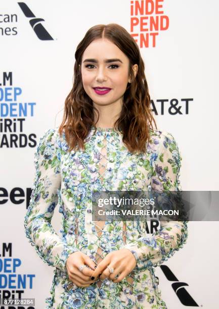 Actress Lily Collins poses during the 2018 Spirit awards during the 2018 Film Independent Spirit Awards Nominations Announcement Press Conference, on...