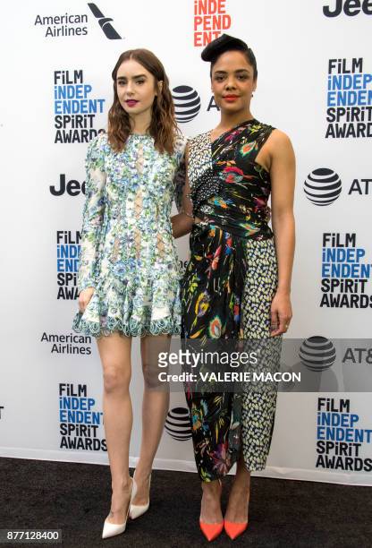 Actresses Lily Collins and Tessa Thompson pose during the 2018 Spirit awards during the 2018 Film Independent Spirit Awards Nominations Announcement...