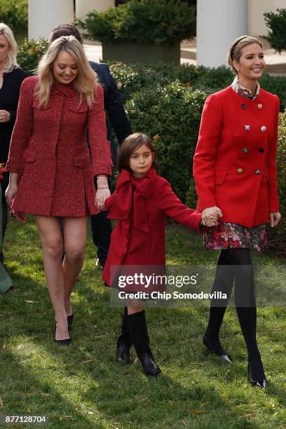 President Donald Trump's daughters Tiffany Trump and Ivanka Trump and her daughter Arabella Kushner leave the Rose Garden after the pardoning...