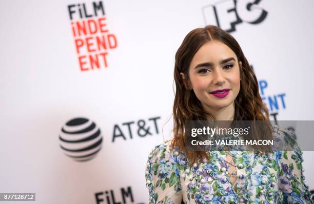 Actress Lily Collins announces the nominees for the 2018 Spirit Awards during the 2018 Film Independent Spirit Awards Nominations Announcement Press...