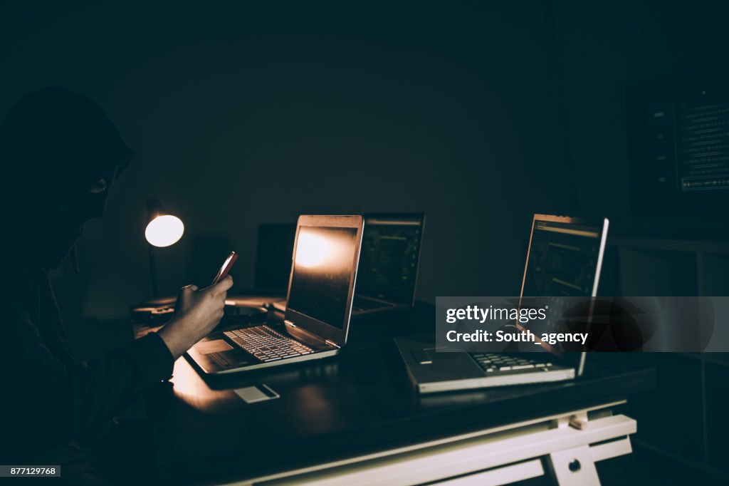 Dangerous hacker with balaclava