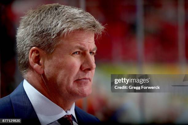 Head coach Bill Peters of the Carolina Hurricanes watches action on the ice during an NHL game against the Dallas Stars on November 13, 2017 at PNC...