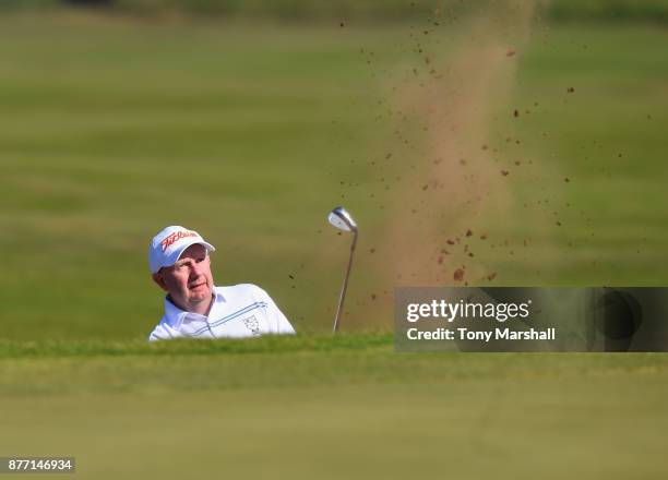 Andrew Baguley of Leigh Golf Club plays out of a bunker on to the 16th green during Day One of the SkyCaddie PGA Pro-Captain Challenge Grand Final at...