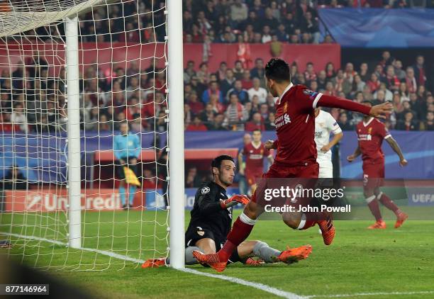 Roberto Firmino of Liverpool scores the opening goal during the UEFA Champions League group E match between Sevilla FC and Liverpool FC at Estadio...