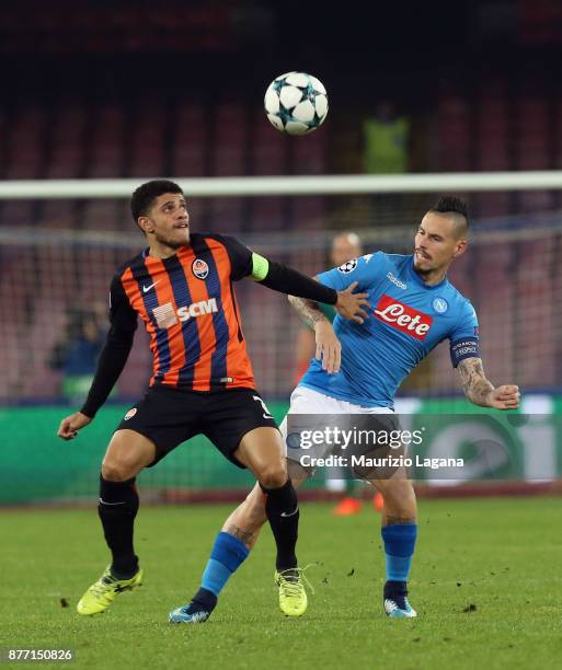 Marek Hamsik of Napoli competes for the ball with Taison of Shakhtar Donetsk during the UEFA Champions League group F match between SSC Napoli and...