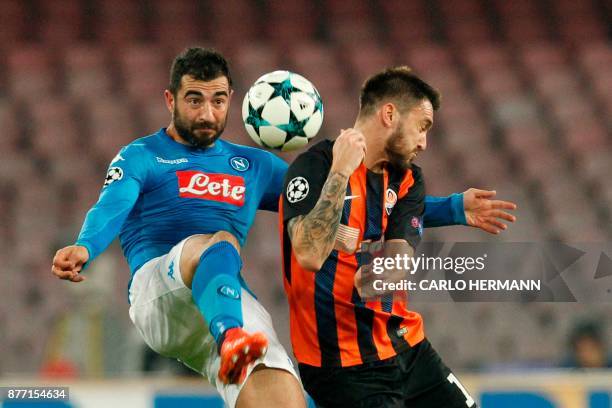 Napoli's defender from Spain Raul Albiol fights for the ball with Shakhtar Donetsk's Argentinian forward Facundo Ferreyra during the UEFA Champions...