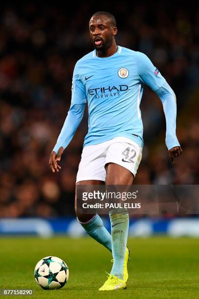 Manchester City's Ivorian midfielder Yaya Toure runs with the ball during the UEFA Champions League Group F football match between Manchester City...