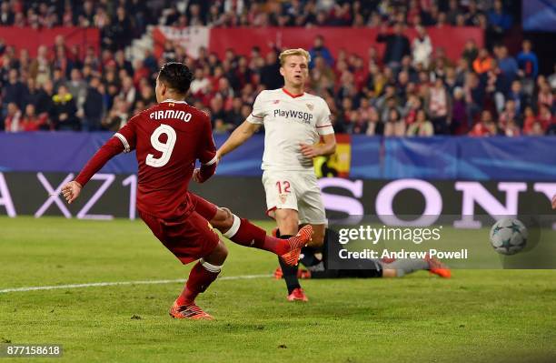 Roberto Firmino of Liverpool scores the third goal during the UEFA Champions League group E match between Sevilla FC and Liverpool FC at Estadio...