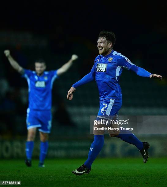 Matt Tootle of Notts County celebrates as Jonathan Forte of Notts County scores his sides first goal during the Sky Bet League Two match between...