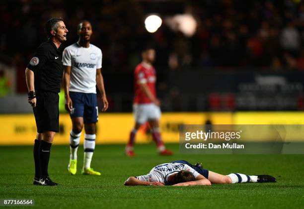Referee, Darren Bond calls for medics as Paul Huntington of Preston North End lies motionless after a head injury during the Sky Bet Championship...