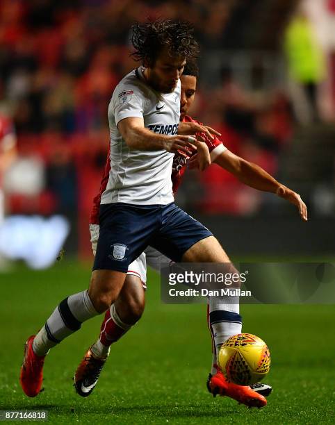 Ben Pearson of Preston North End holds off Korey Smith of Bristol City during the Sky Bet Championship match between Bristol City and Preston North...