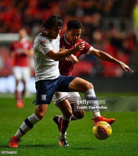Ben Pearson of Preston North End holds off Korey Smith of Bristol City during the Sky Bet Championship match between Bristol City and Preston North...