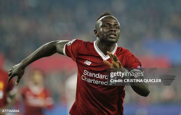 Liverpool's Senegalese midfielder Sadio Mane celebrates after scoring a goal on November 21, 2017 at the Ramon Sanchez Pizjuan stadium in Sevilla...