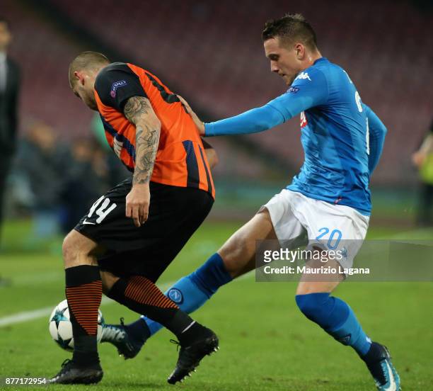 Piotr Zielinsky of Napoli competes for the ball with Yaroslav Rakitskiy of Shakhtar Donetsk during the UEFA Champions League group F match between...