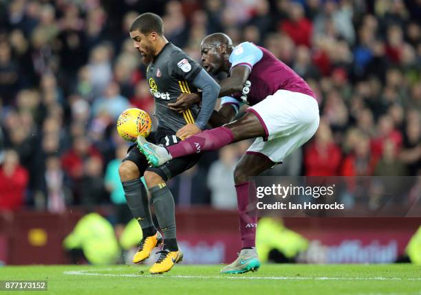 Lewis Grabban of Sunderland holds off Chris Samba of Villa during the Sky Bet Championship match between Aston Villa and Sunderland at Villa Park on...