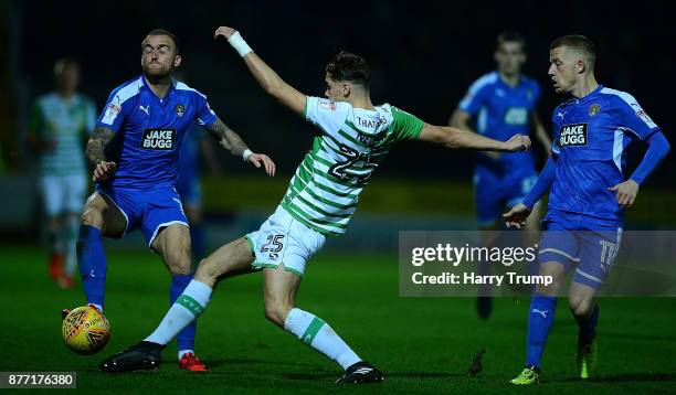 Lewis Alessandra of Notts County is tackled by Sid Nelsen of Yeovil Town during the Sky Bet League Two match between Yeovil Town and Notts County at...