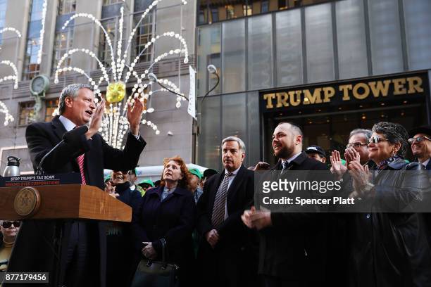 New York Mayor Bill de Blasio joins other Democratic officials, labor members and activists in front of Trump Tower to protest against the proposed...