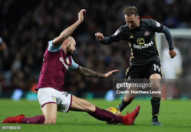 Alan Hutton of Aston Villa tackles Aidan McGeady of Sunderland during the Sky Bet Championship match between Aston Villa and Sunderland at Villa Park...