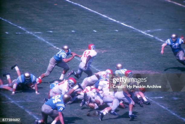 Paul Warfield of the Ohio State Buckeyes runs with the ball during an NCAA game against the UCLA Bruins on October 6, 1962 at the Los Angeles...